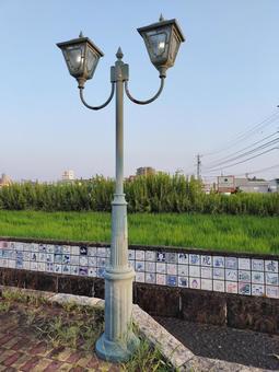 街の一角にあるおしゃれな街灯 街の一角にあるおしゃれな街灯 街灯,おしゃれ,レンガの写真素材