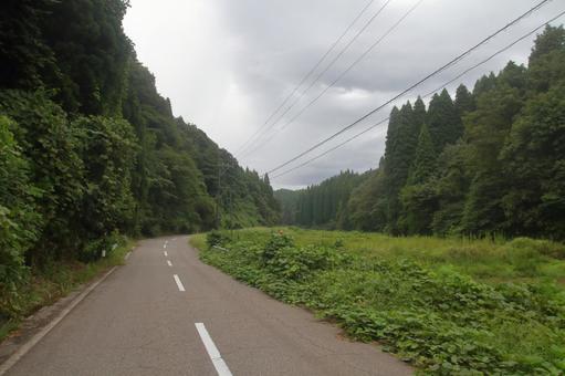 田舎の一本道、富山県富山市 田舎の一本道、富山県富山市 田舎,道,道路の写真素材