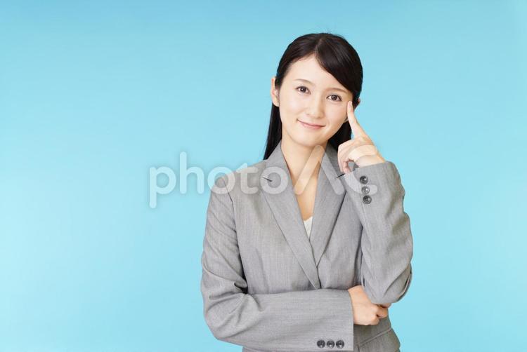 考え事をするビジネスウーマン 女性,ビジネスウーマン,女の写真素材