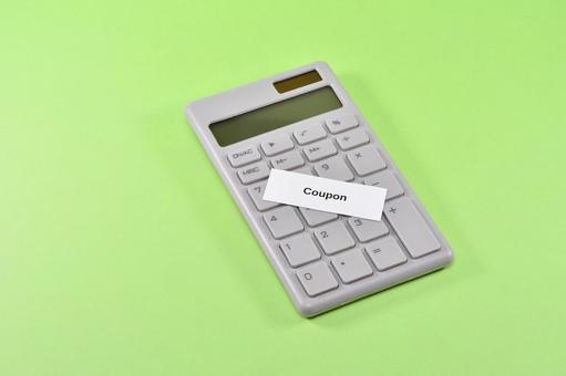 電卓とcouponで節約のイメージ 電卓とcouponで節約のイメージの写真