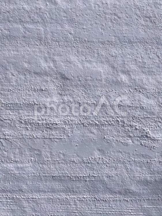 冬の圧雪アイスバーンのテクスチャ02 雪道,車道,圧雪の写真素材