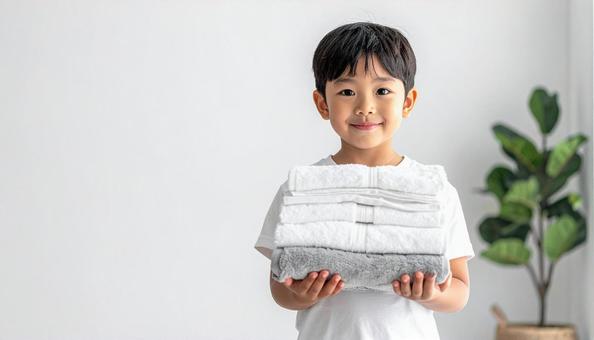 タオルと子供 タオルと子供の写真