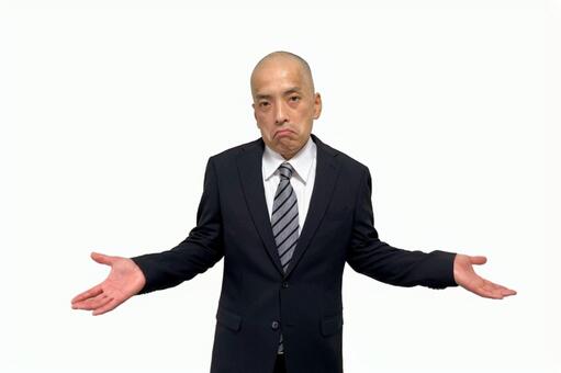 両手を広げてお手上げのスーツ中年男性 男性,ビジネス,スーツの写真素材