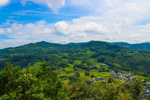 里山の風景5 山,棚田,空の写真素材