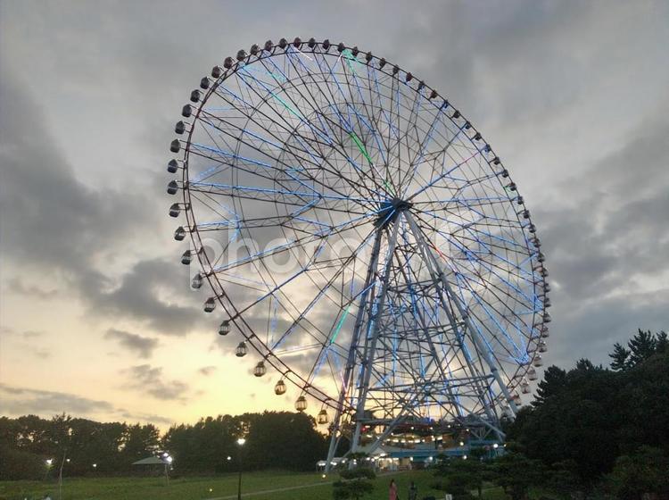 夕暮れの観覧車 夕暮れ,夕日,乗り物の写真素材
