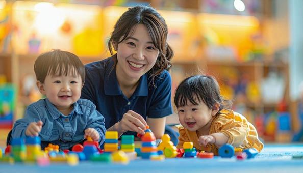 笑顔の保育士と遊ぶ子どもたち 笑顔の保育士と遊ぶ子どもたちの写真