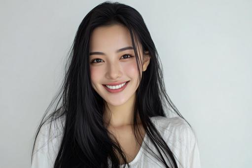 笑顔の美しい黒髪日本女性の写真