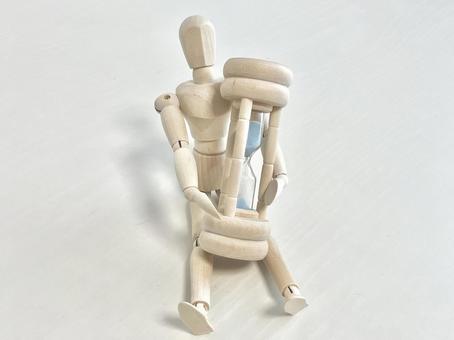 砂時計にしがみつくデッサン人形 砂時計にしがみつくデッサン人形 デッサン人形,砂時計,時計の写真素材