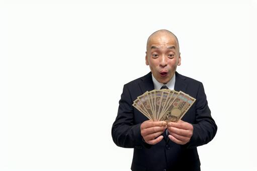 お金を稼いで驚くスーツの中年男性 金,男,ダメ男の写真素材