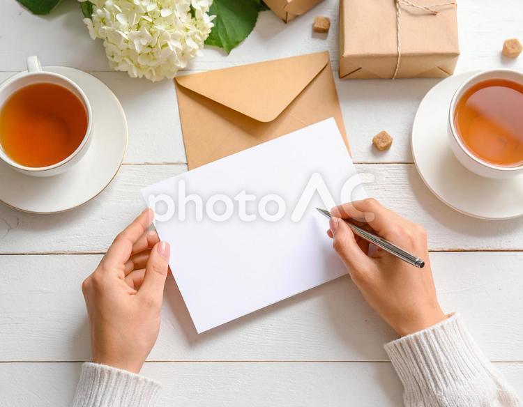 紙に書く③ ペン,手,手紙の写真素材