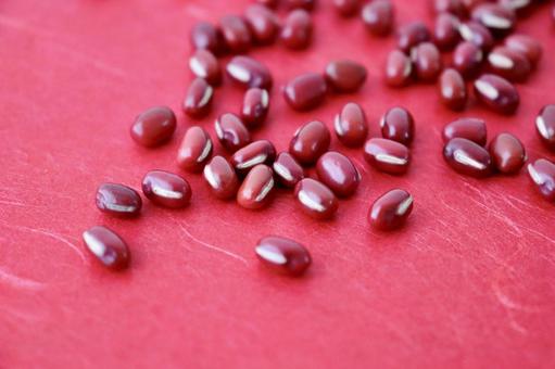 Scattered red beans red background, JPG Scattered red beans red background, JPG