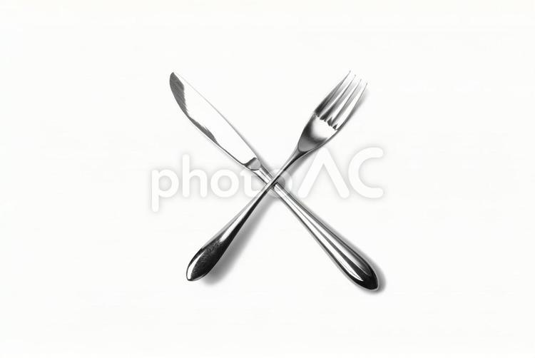 クロスされたフォークとナイフ フォーク,食事,ナイフの写真素材