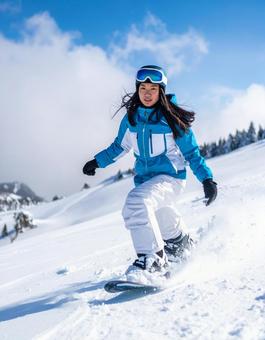 若い女性スノーボーダー・ゲレンデ 若い女性スノーボーダー・ゲレンデの写真