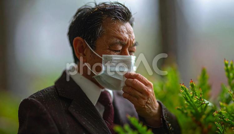 マスクをして咳をするビジネスマン アレルギー,インフルエンザ,ウイルスの写真素材