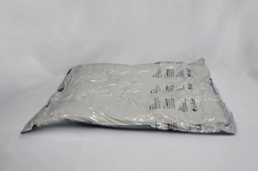 圧縮袋に収納された布団 圧縮袋,収納,布団の写真素材