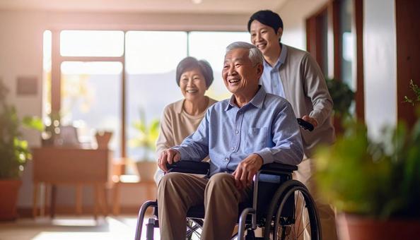 介護施設のシニア男性と見舞いに来た家族 介護施設のシニア男性と見舞いに来た家族の写真