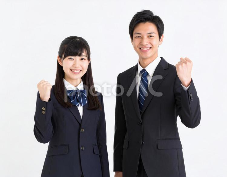 ガッツポーズでエールを送る男女高校生 高校生,男女,生徒の写真素材