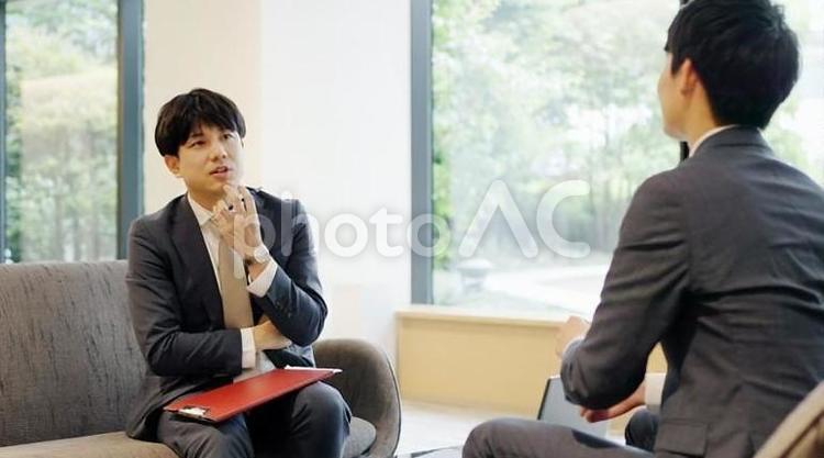 打ち合わせをするビジネスパーソン 打ち合わせ,アドバイス,助言の写真素材