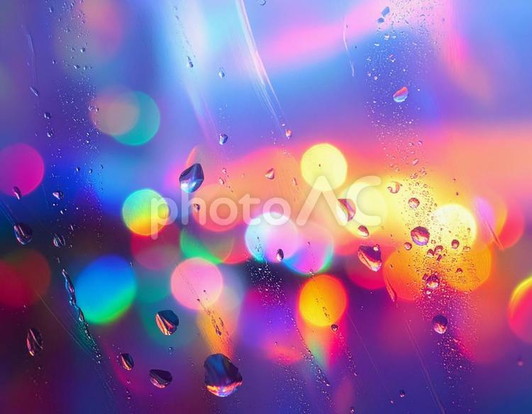 ガラスについた水滴とプリズムの光 ガラス,水滴,雨の写真素材
