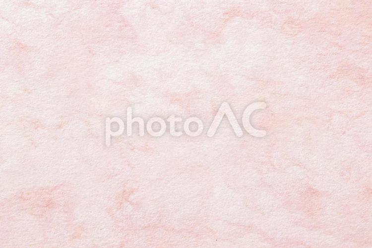 でこぼこした質感のピンク色の和紙の背景 ピンク,紙,ざらざらの写真素材