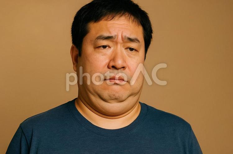 二重アゴの中年男性・顔のたるみ・肥満 二重アゴ,中年男性,顔のたるみの写真素材
