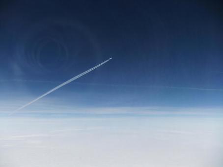 Contrail above the clouds Contrail above the clouds
