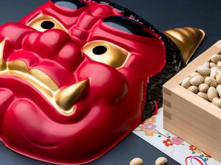 赤鬼のお面と節分の豆まきのイメージ 節分,豆まき,福豆の写真素材