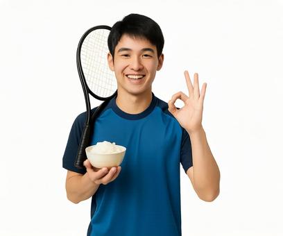 食事とスポーツを楽しむ若い男性 食事とスポーツを楽しむ若い男性の写真