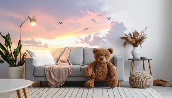 クマのぬいぐるみとソファの写真