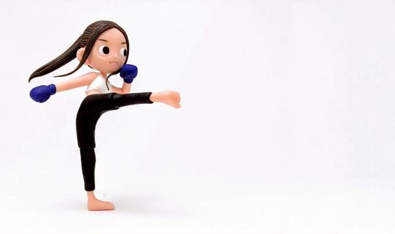 キックボクシングの練習をする女性 D キックボクシングの練習をする女性 D キックボクシング,キック,ダイエットの写真素材