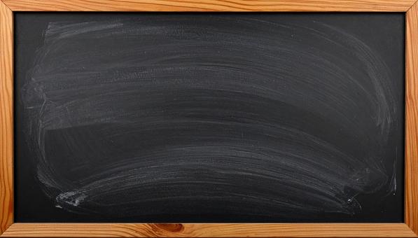 拭き跡の残る黒板のクローズアップ背景画像 拭き跡の残る黒板のクローズアップ背景画像の写真