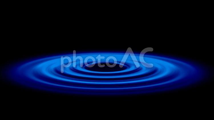 黒い背景に青色の光の波紋 波紋,広がる,光の写真素材