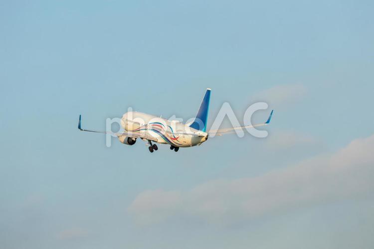 最後の光に照らされて 飛行機,航空機,旅客機の写真素材