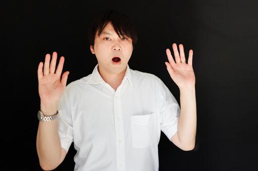 驚く男性の表情 男性,表情,驚きの写真素材