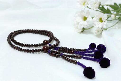 Nichiren sect prayer beads and white flowers, JPG Nichiren sect prayer beads and white flowers, JPG