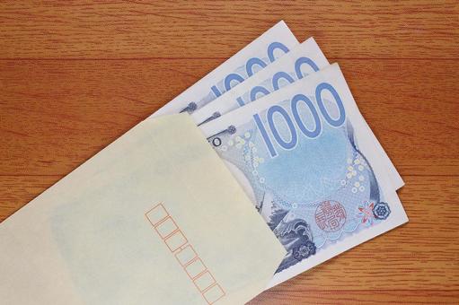 茶封筒に入れた千円札 茶封筒に入れた千円札 茶封筒,封筒,クラフト封筒の写真素材