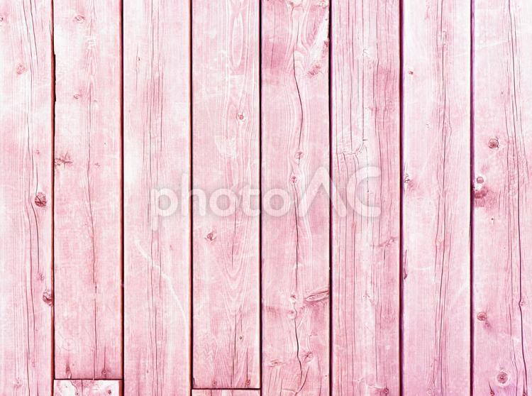 ピンク色の木目の背景画像 木目,ピンク,もくめの写真素材