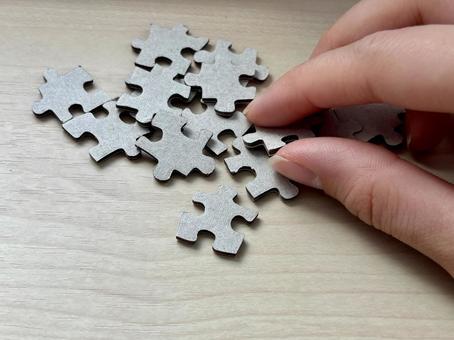 パズルのピースを取る パズルのピースを取る パズルのピース,ピース,パズルの写真素材