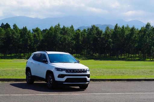 車と公園 suv,公園,駐車場の写真素材