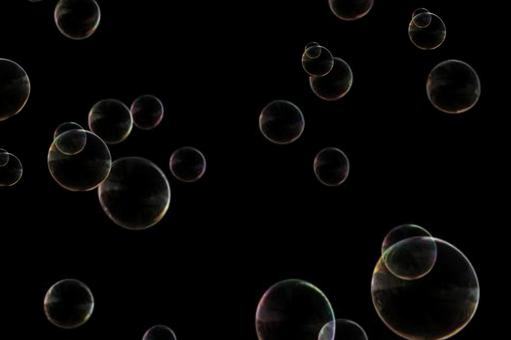 Transparent fluffy soap bubbles on a black background Transparent fluffy soap bubbles on a black background