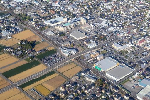 長野県松本市の篠ノ井線平田駅付近を空撮 空撮,航空写真,篠ノ井線の写真素材