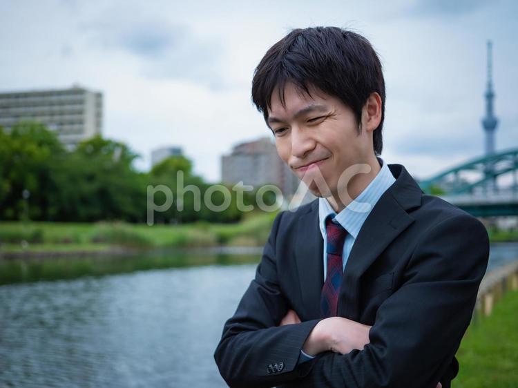 【男性】サラリーマン、いろいろ悩む ビジネス,ビジネスマン,会社員の写真素材