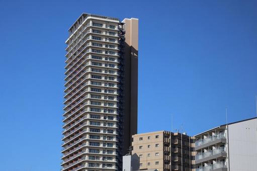 青空と超高層マンションのある街並み 青空と超高層マンションのある街並み 青空,超高層マンション,街並みの写真素材