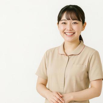 笑顔で微笑む介護スタッフ 笑顔で微笑む介護スタッフの写真