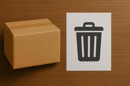段ボール箱とゴミ箱マークの廃棄イメージの写真