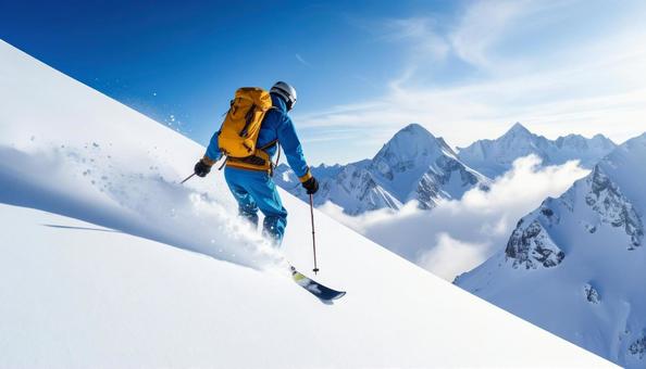 雪山をダイナミックに滑降するスキーヤー 雪山をダイナミックに滑降するスキーヤーの写真