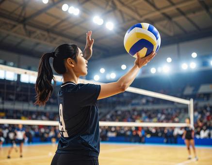 サーブをするバレーボール選手 サーブをするバレーボール選手の写真