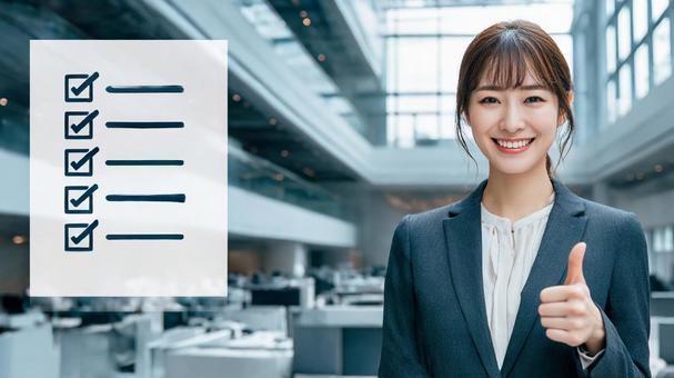 チェックボックスと女性会社員2 チェックボックスと女性会社員2の写真