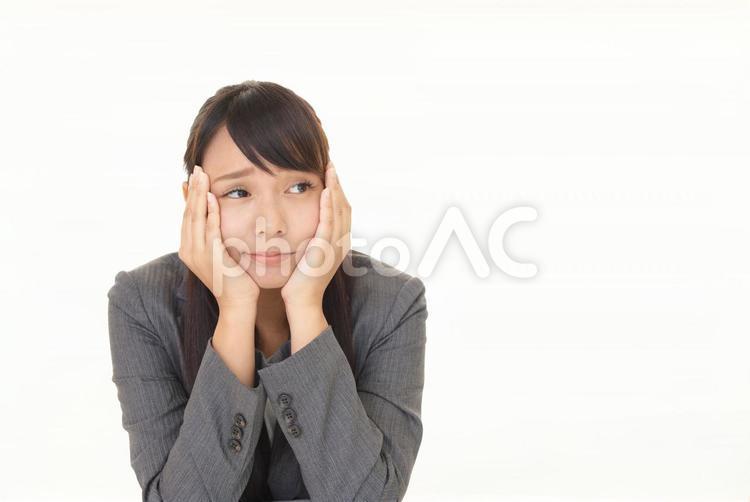 憂鬱な表情のビジネスウーマン 女性,ビジネウーマン,女の写真素材