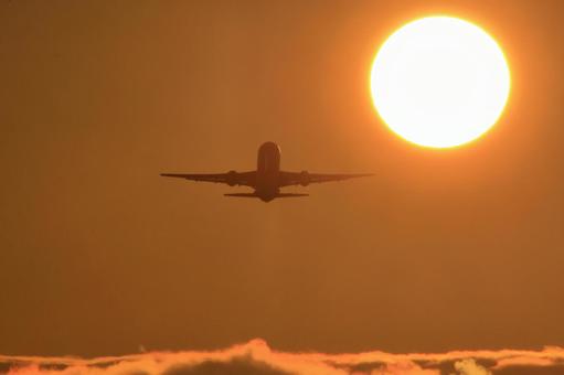 太陽と飛行機 太陽と飛行機の写真